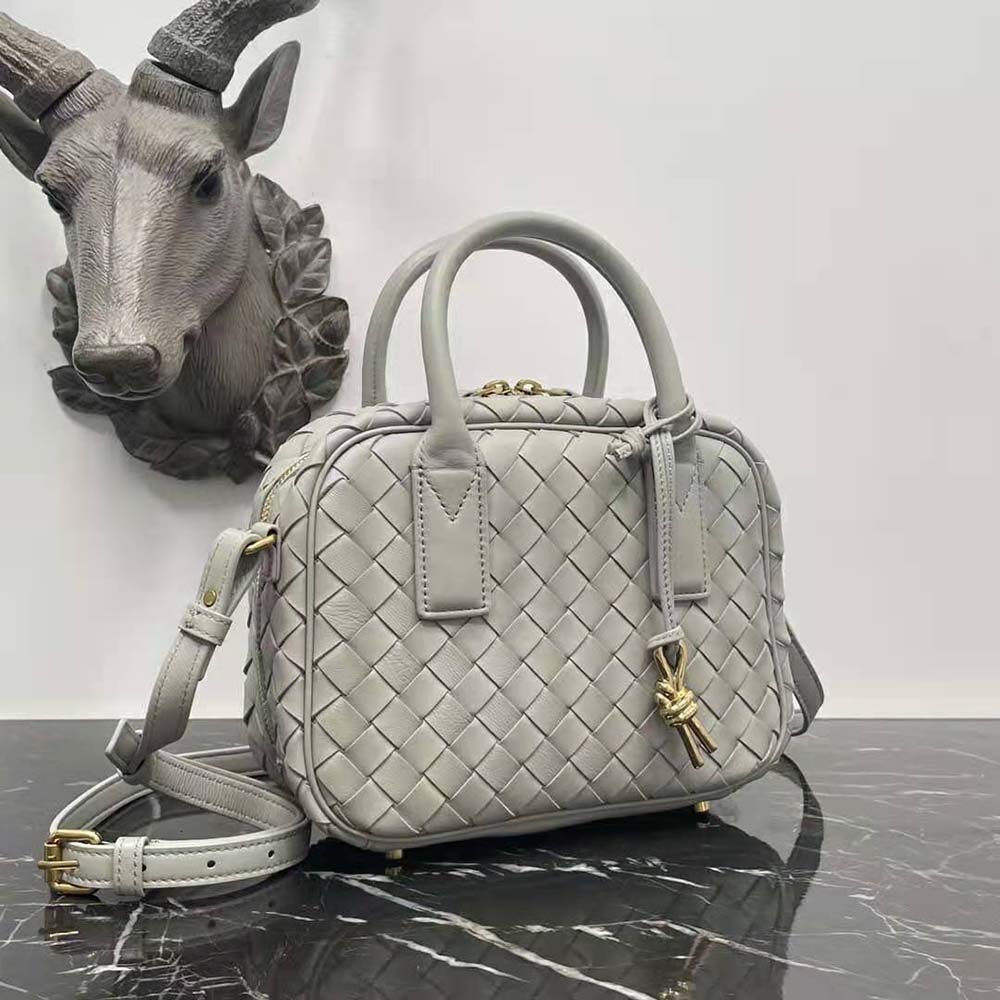 Side profile showing magnetic closure on Bottega Veneta Men Small Getaway