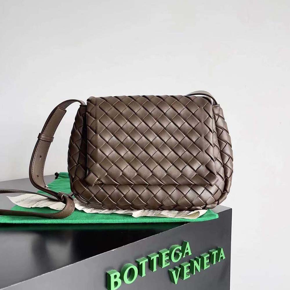 Close-up of signature woven leather detail on Bottega Veneta messenger