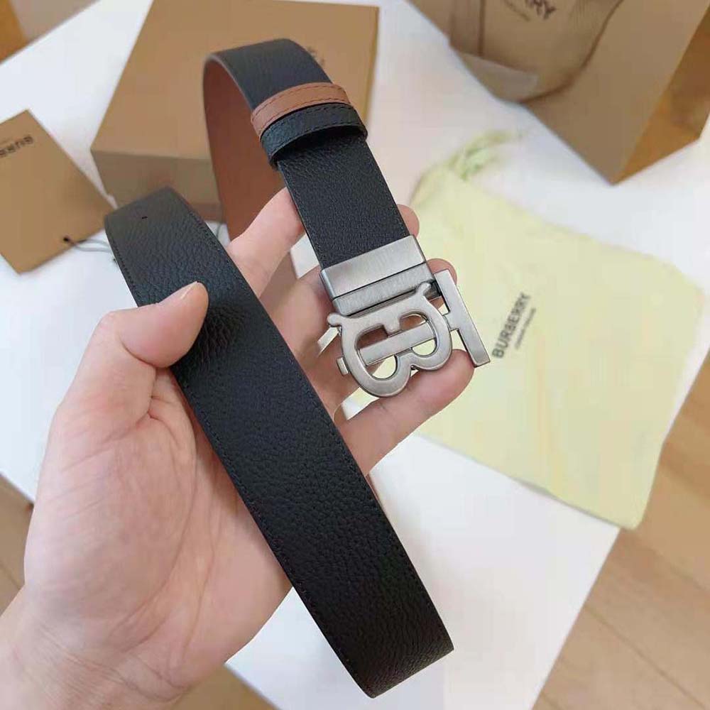 Side angle of Burberry Men Reversible Leather TB Belt-Black highlighting reversible feature