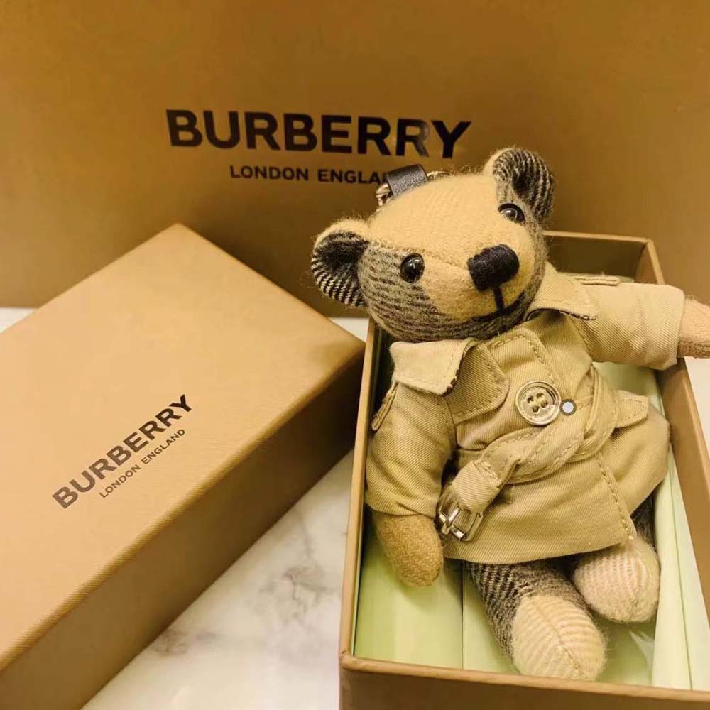 Close-up of the trench coat detail on Burberry Thomas Bear Charm