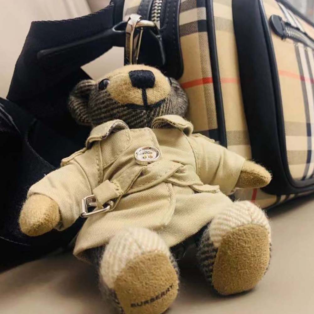 Side angle showing metal clasp of Burberry Unisex Thomas Bear Charm