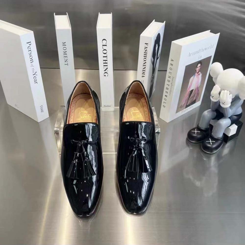 Close-up of tassel detail on Christian Louboutin Men Dandelion Tassel Loafers