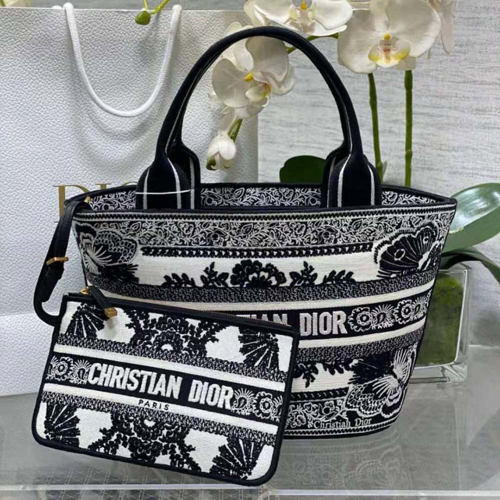 Close-up on butterfly embroidery detail of Dior Women Hat Basket Bag White and Black Butterfly Bandana Embroidery