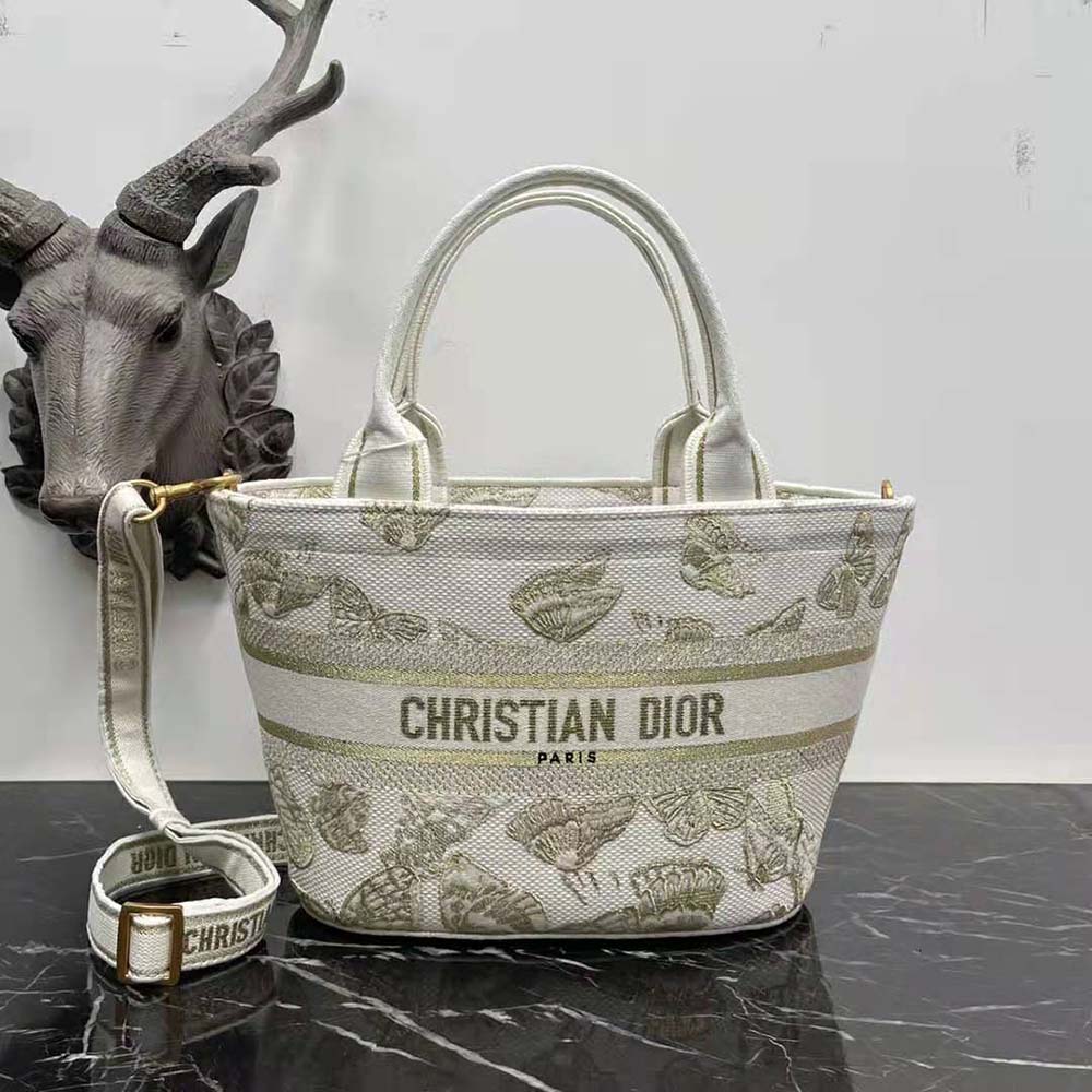 Close-up of gold-tone gradient butterfly embroidery on Dior Women Hat Basket Bag White