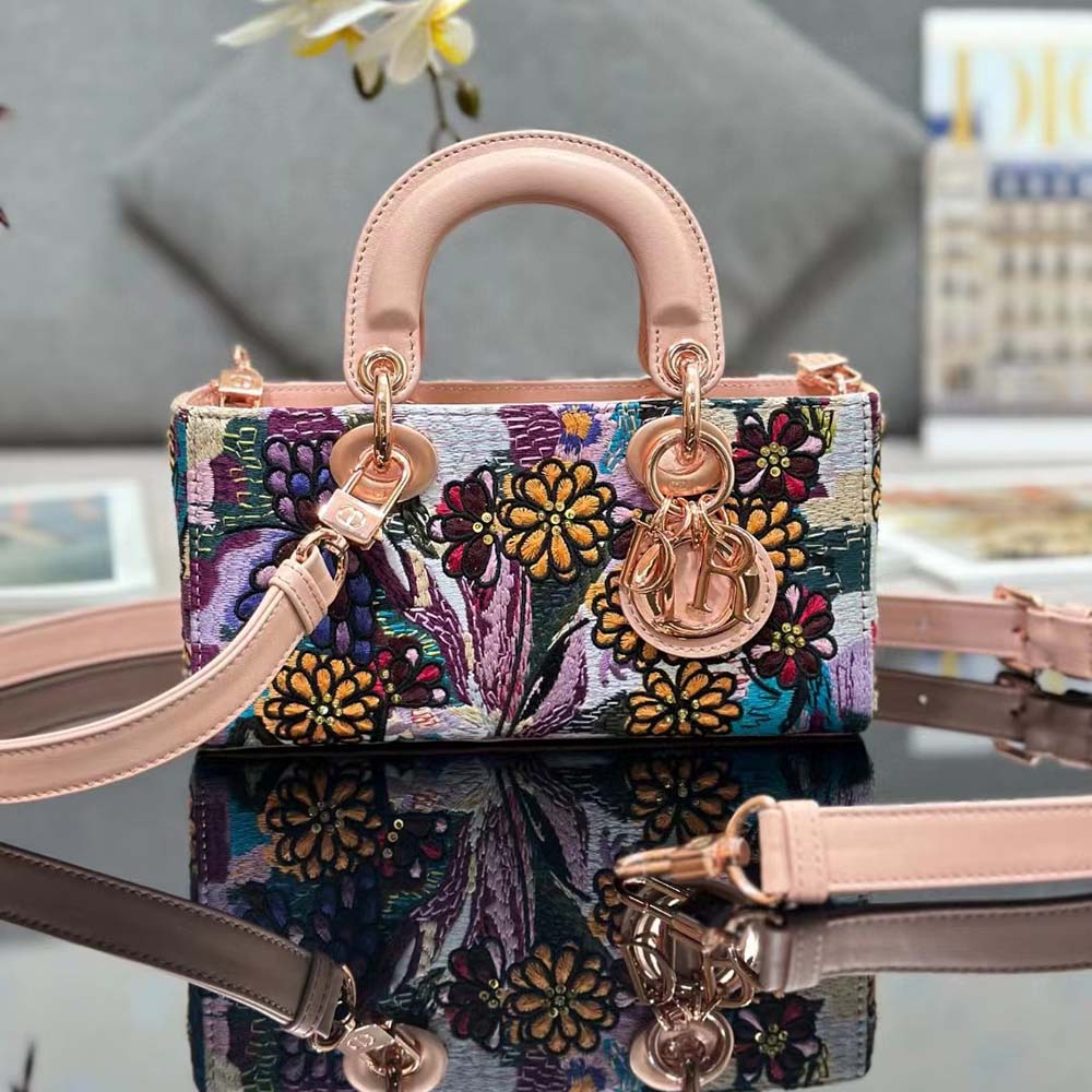 Side angle showing green embroidery detail on Dior Women Medium Lady D-joy Bag