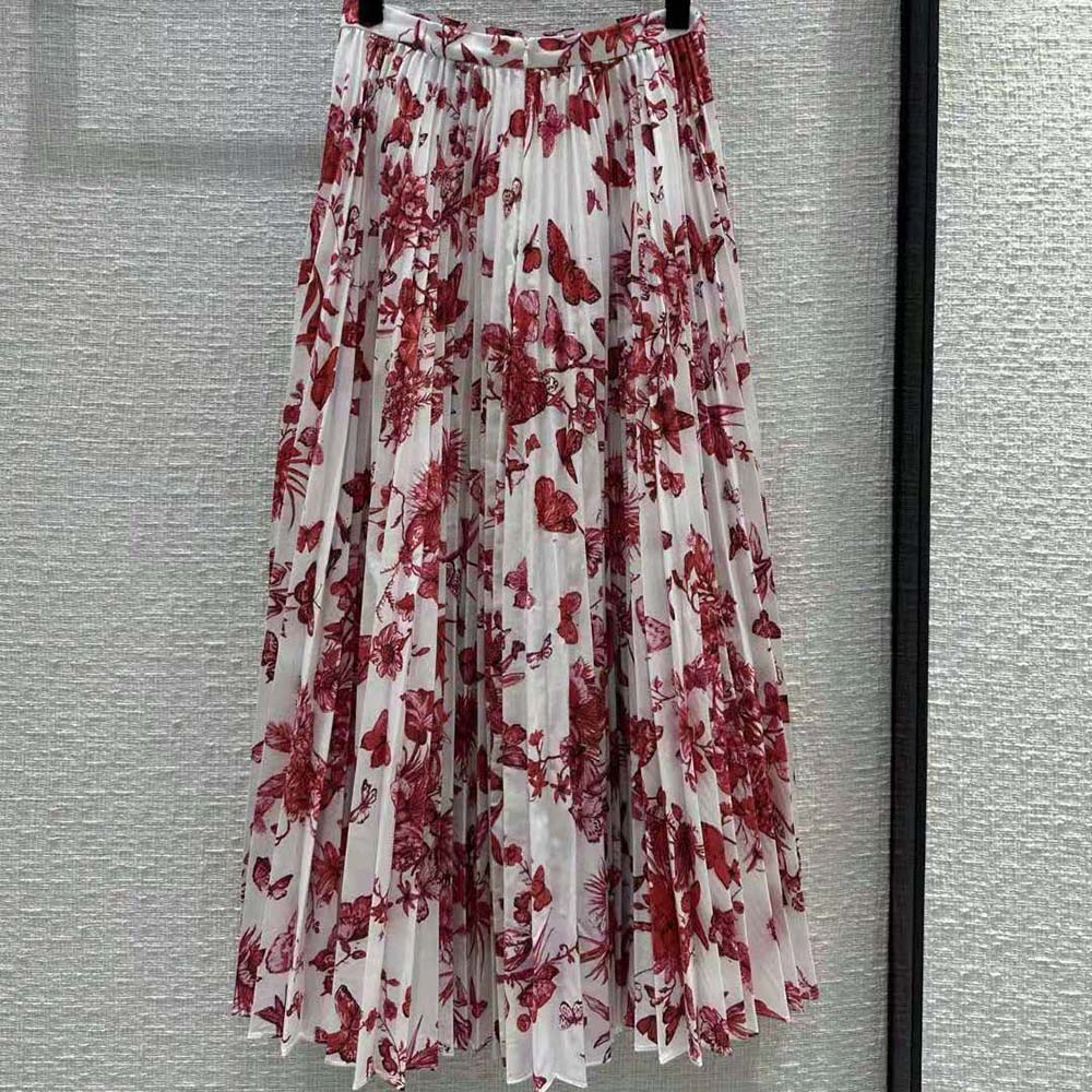 Side angle showing pleated silhouette and invisible zip on Dior cotton denim skirt