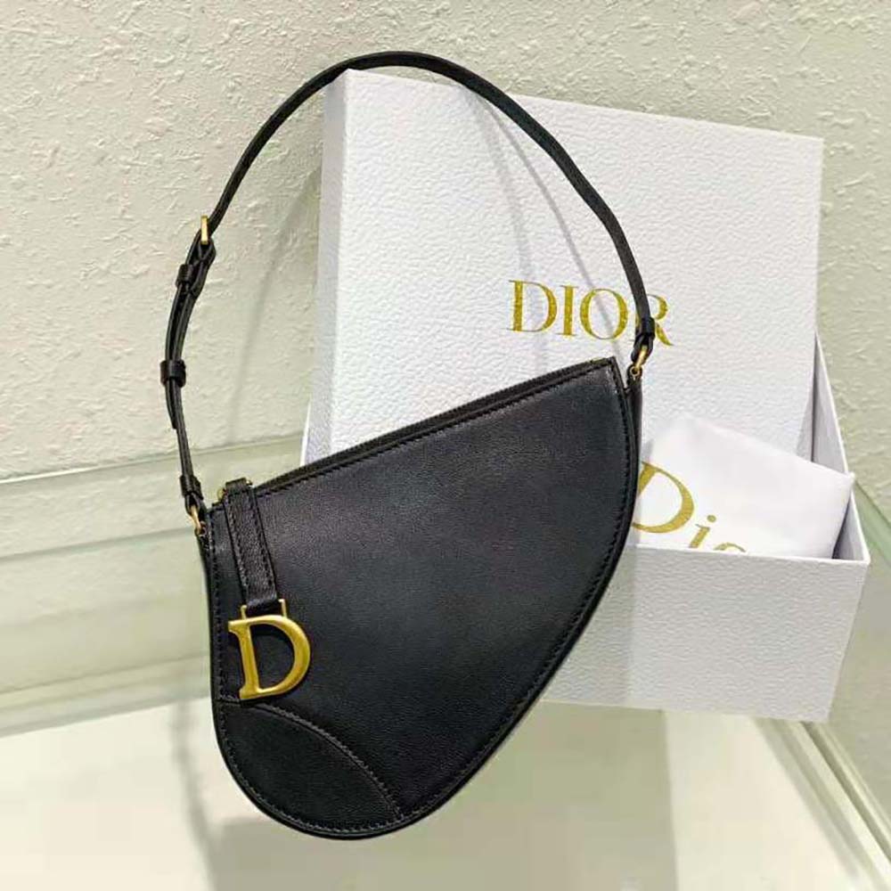 Close-up of flap and antique gold-tone hardware on Dior Women Saddle Shoulder Pouch