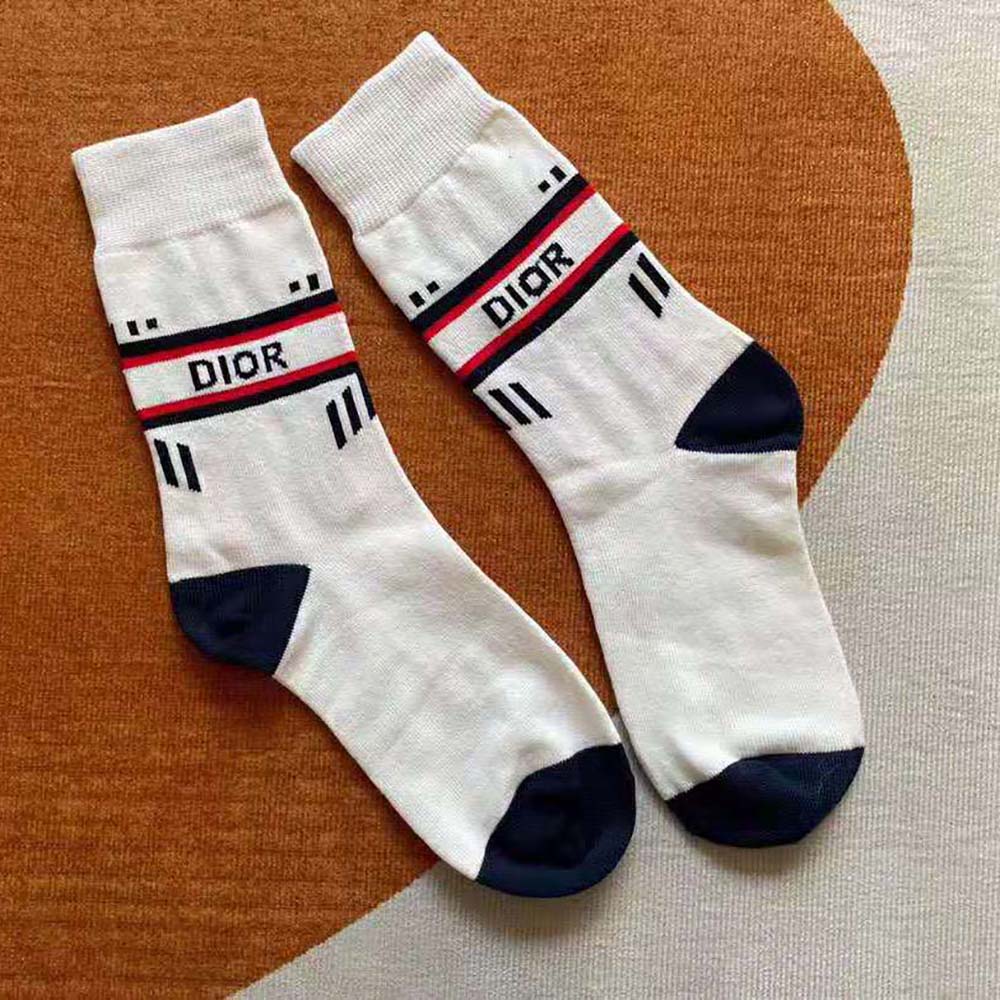 Side angle showing mid-calf length of Dior Women Socks White and Ecru