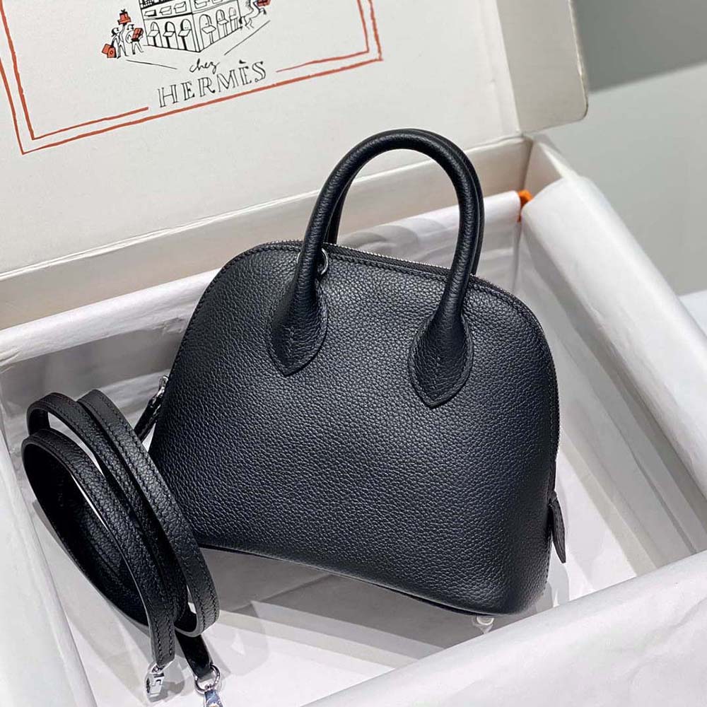 Side view showing slim profile of Hermes Unisex Bolide 1923 Bag