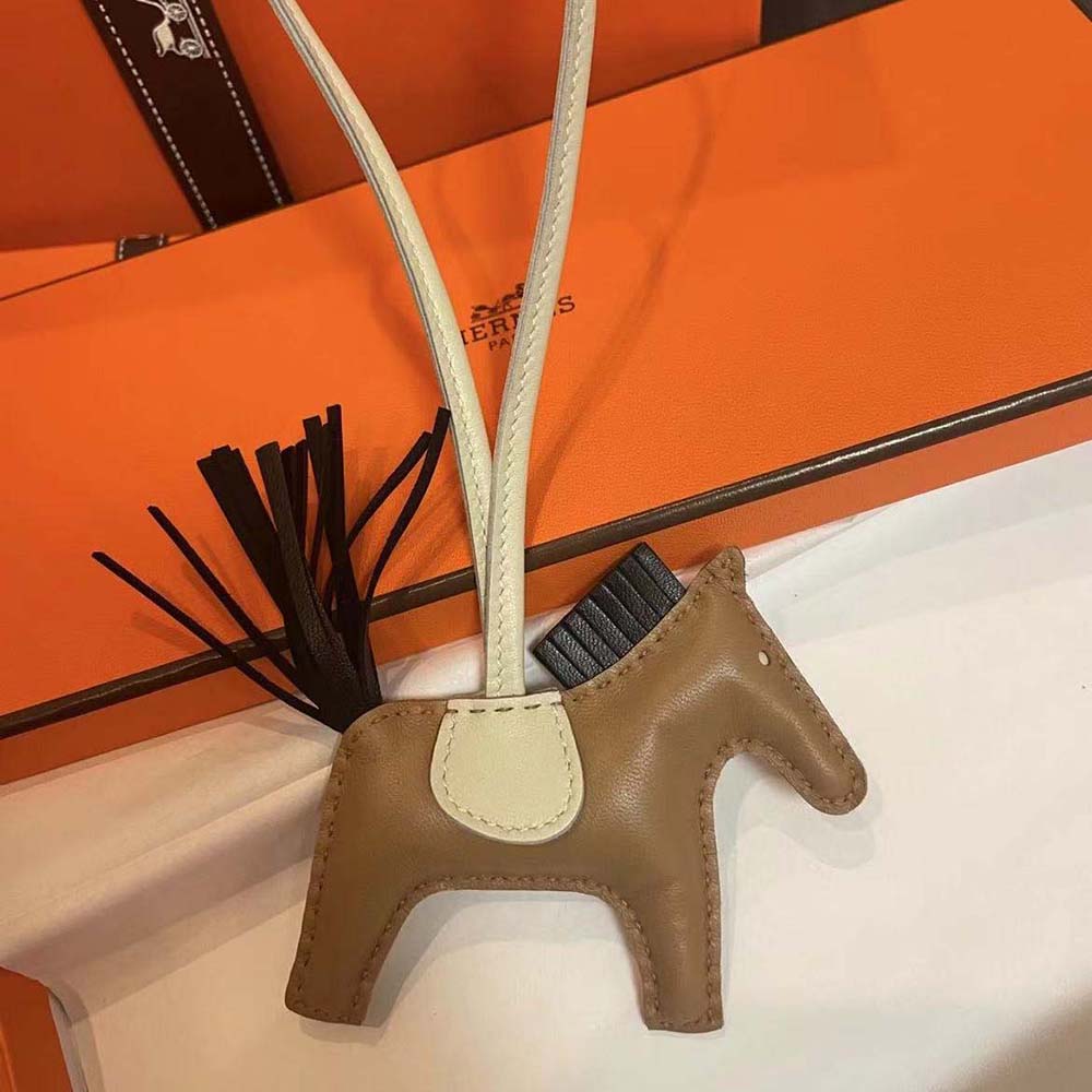 Hermes Unisex Rodeo MM Charm-Brown attached to handbag handle