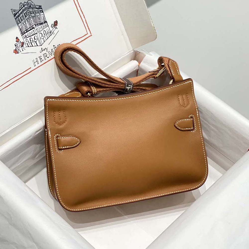 Side angle showing curved shoulder strap on Hermes Women Jyspiere