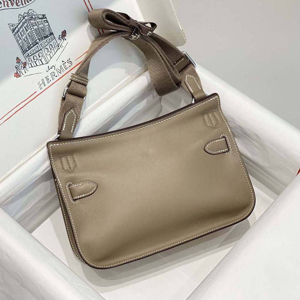 Side angle showing structured silhouette of Hermes Women Jyspiere