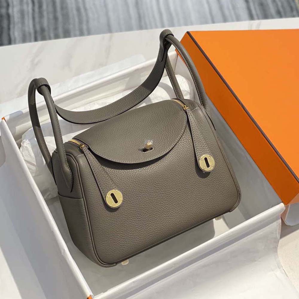 Close-up of Clemence leather texture and gold clasp on Hermes Women Lindy 26