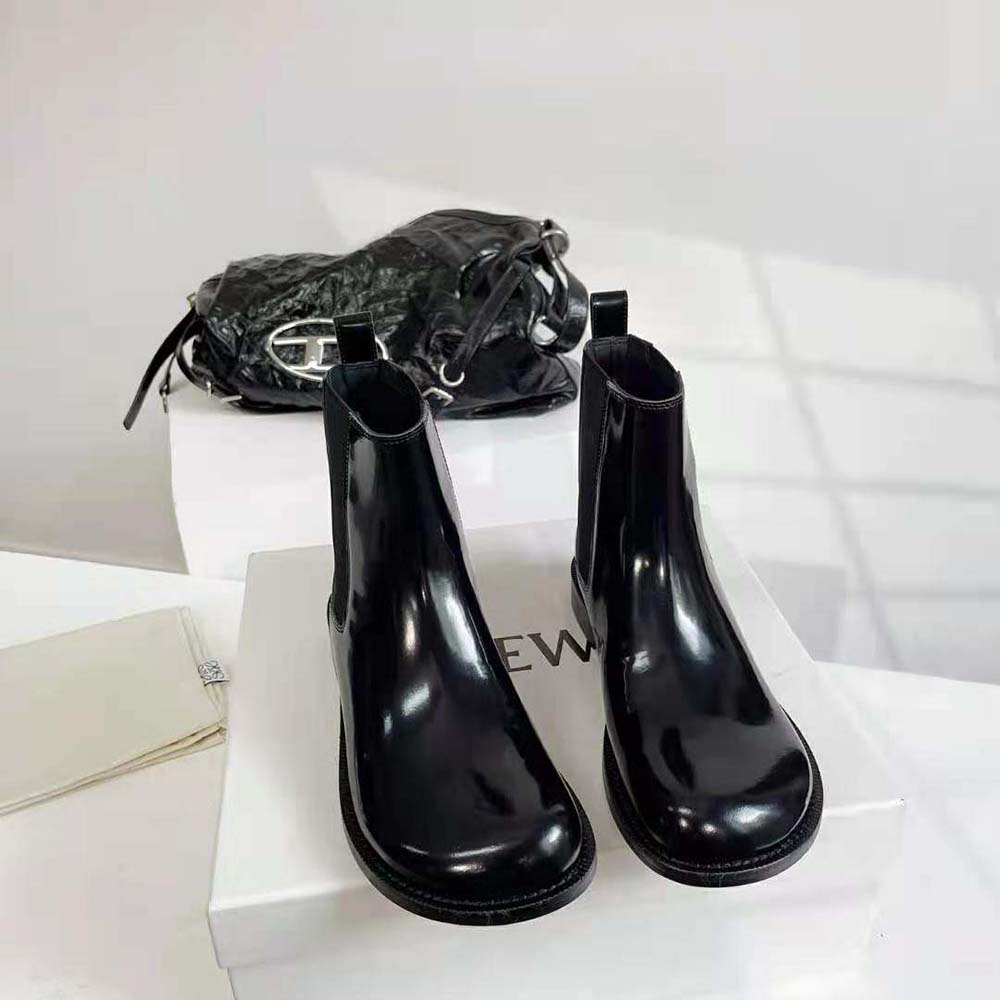Close-up on elastic side panel and leather texture of Loewe Campo Boot