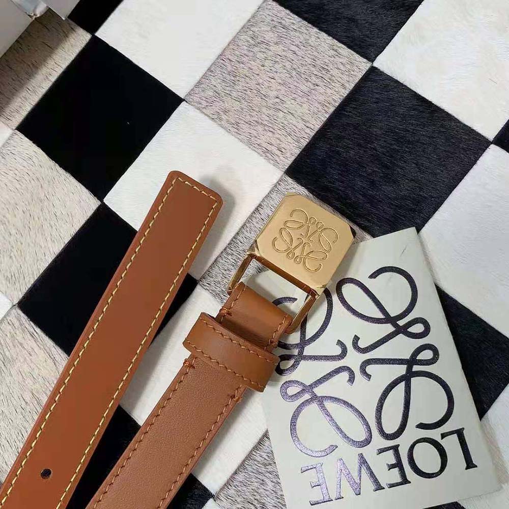 Side angle showing slim silhouette of Loewe Women Amazona Padlock Belt
