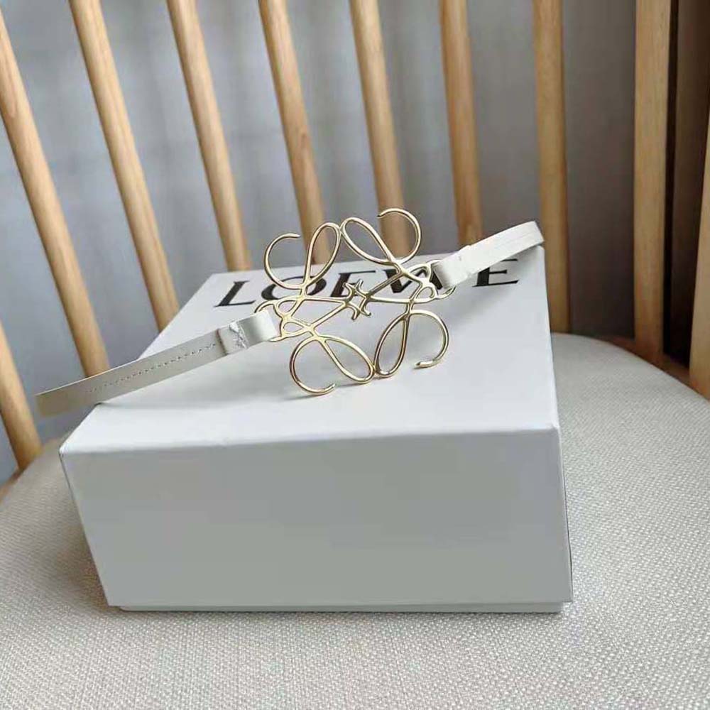 Close-up of embossed Anagram logo on Loewe Women Anagram Belt in white leather