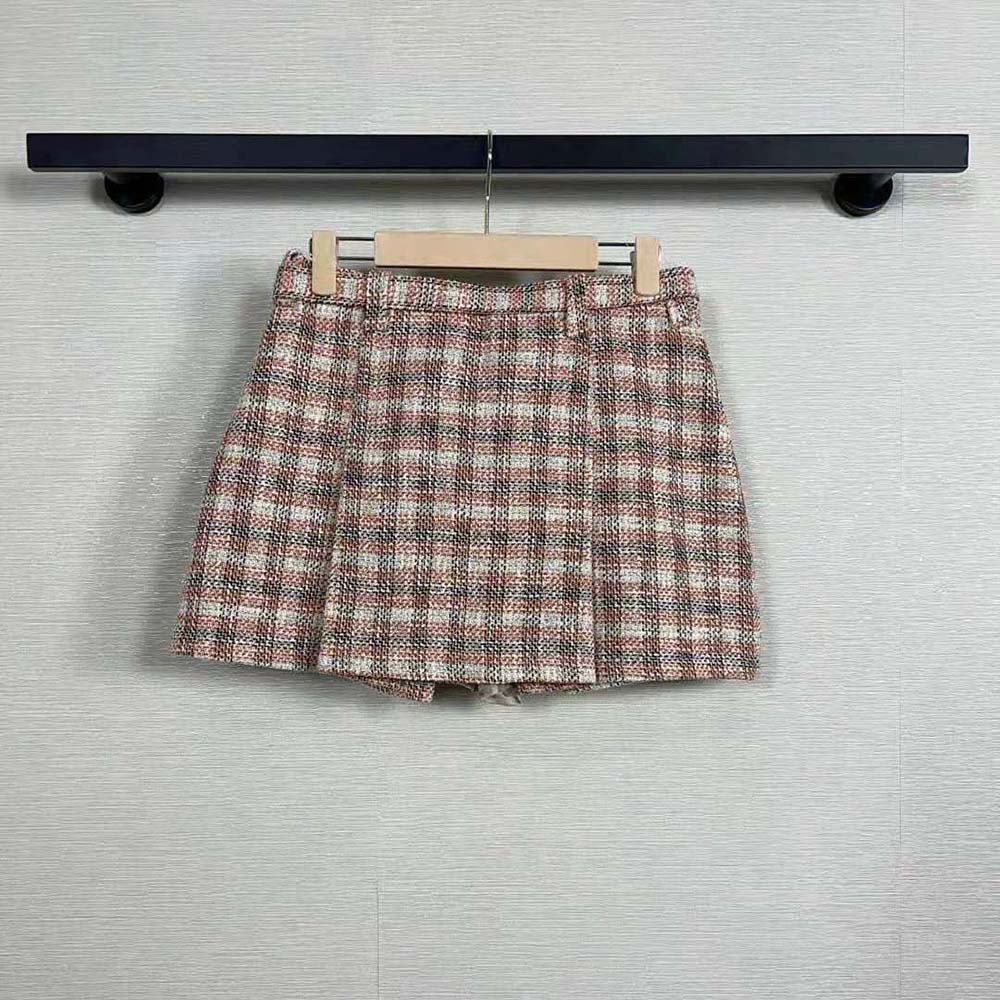 Side angle showing A-line silhouette of Miu Miu Women Check Miniskirt With Logo-decorated