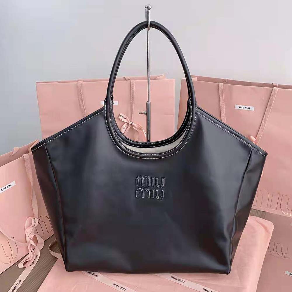 Close-up of black leather logo lettering on Miu Miu Women IVY Leather Bag