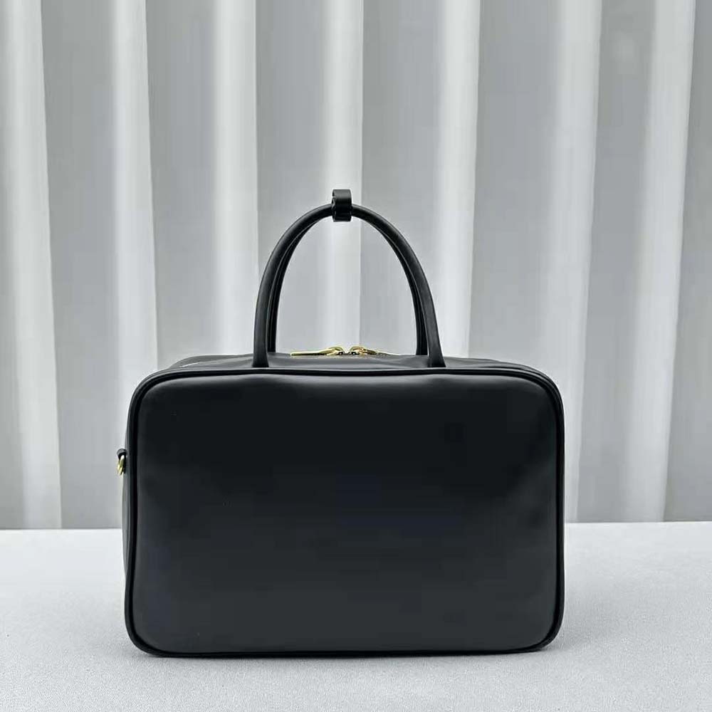 Side angle showing structured silhouette of Miu Miu Women Leather Top-handle Bag with Embossed Lettering Logo-Black