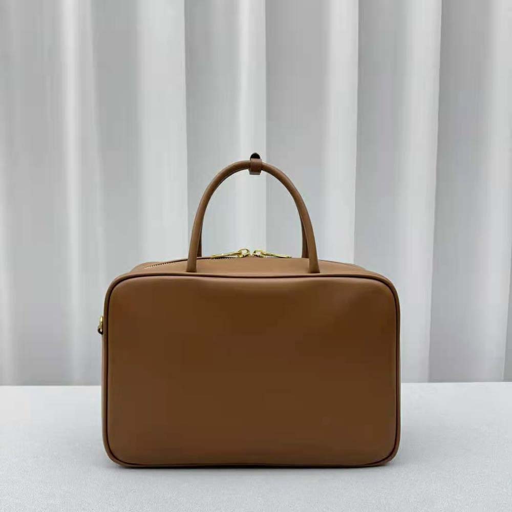 Side view showing silver hardware on Miu Miu Women Leather Top-handle Bag