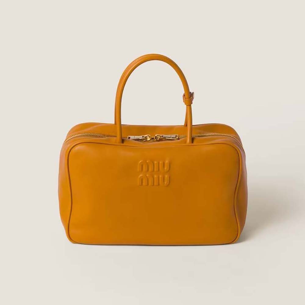 Front view of Miu Miu Women Leather Top-handle Bag Orange showcasing embossed logo