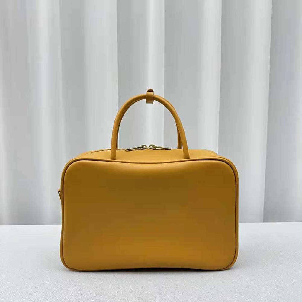 Side angle of structured Miu Miu Women Leather Top-handle Bag with handle detail