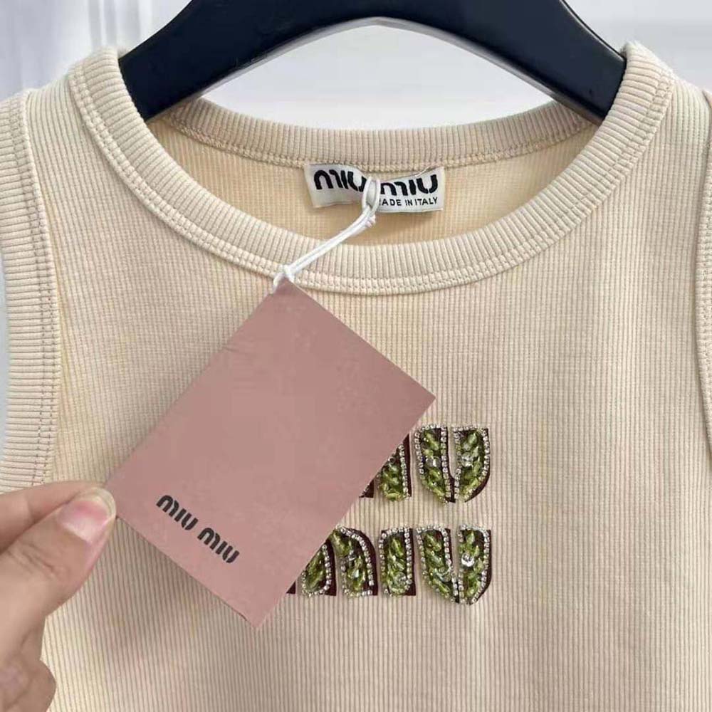 Side profile showing fitted silhouette of Miu Miu Women Ribbed Jersey Top