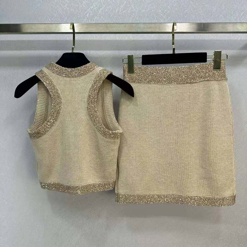 Side angle highlighting silhouette and subtle logo on Miu Miu Women Silk Knit Top-Beige
