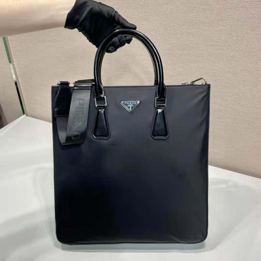 Close-up of brushed leather trim and silver hardware on Prada tote