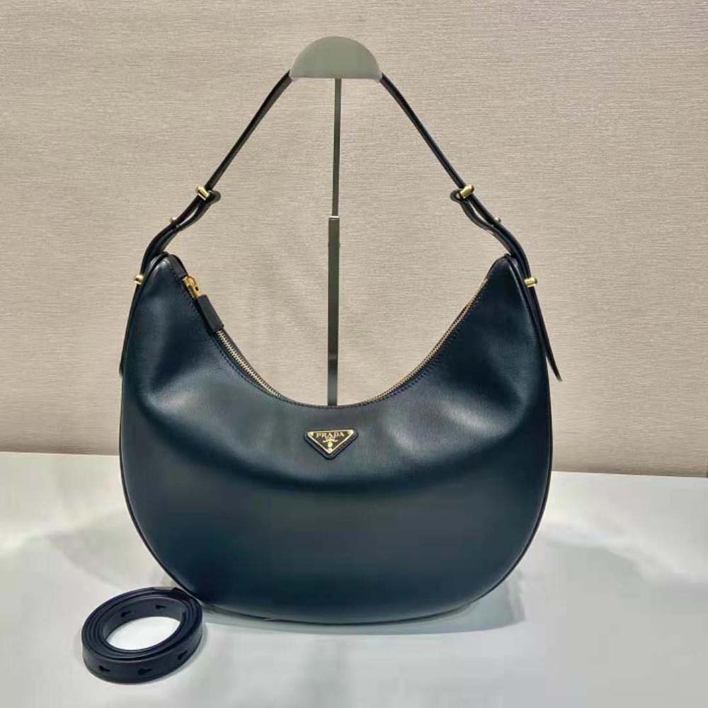 Close-up of gold hardware on Prada Women Large Leather Shoulder Bag-Black
