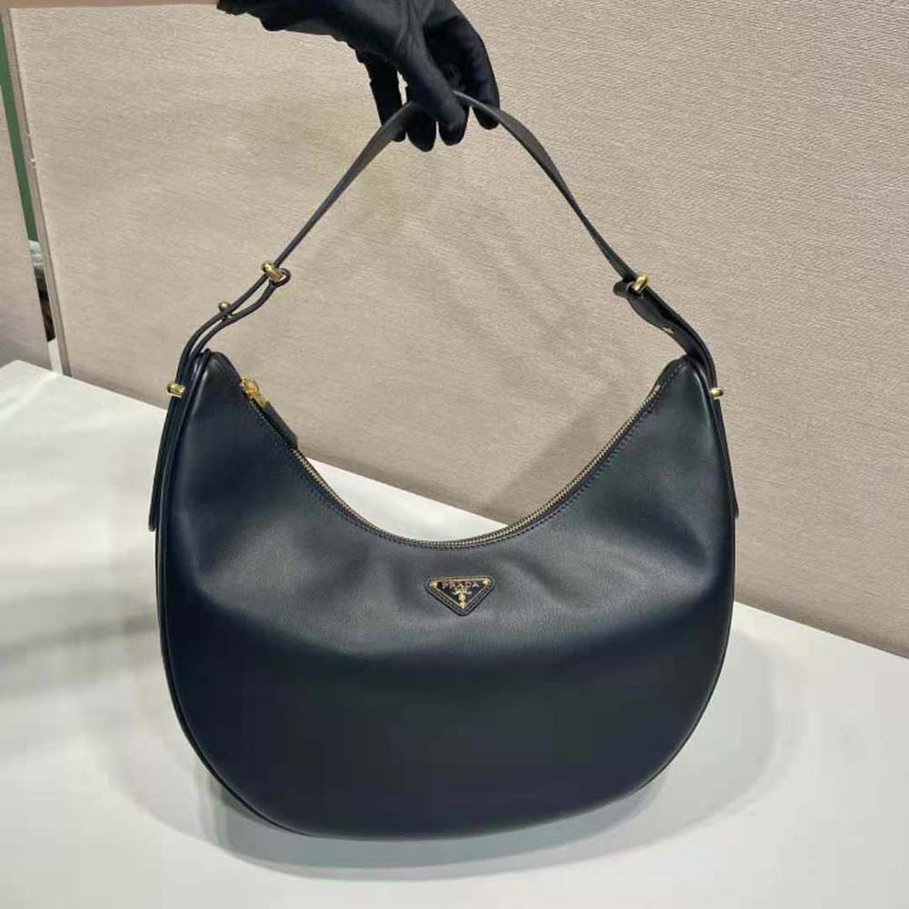 Side profile showing silhouette of Prada Women Large Leather Shoulder Bag-Black