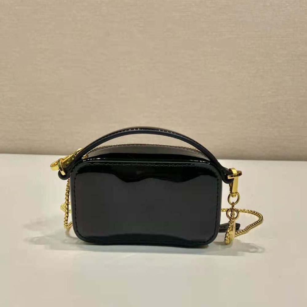 Side angle showcasing slim silhouette of Prada Women Patent Leather Mini-pouch-Black