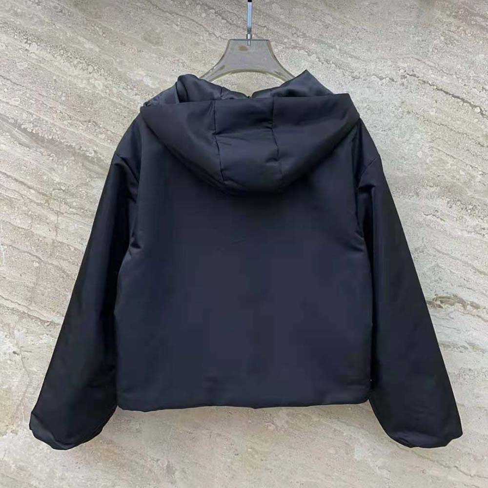 Side profile showing relaxed silhouette of Prada Women Re-Nylon Blouson Jacket black