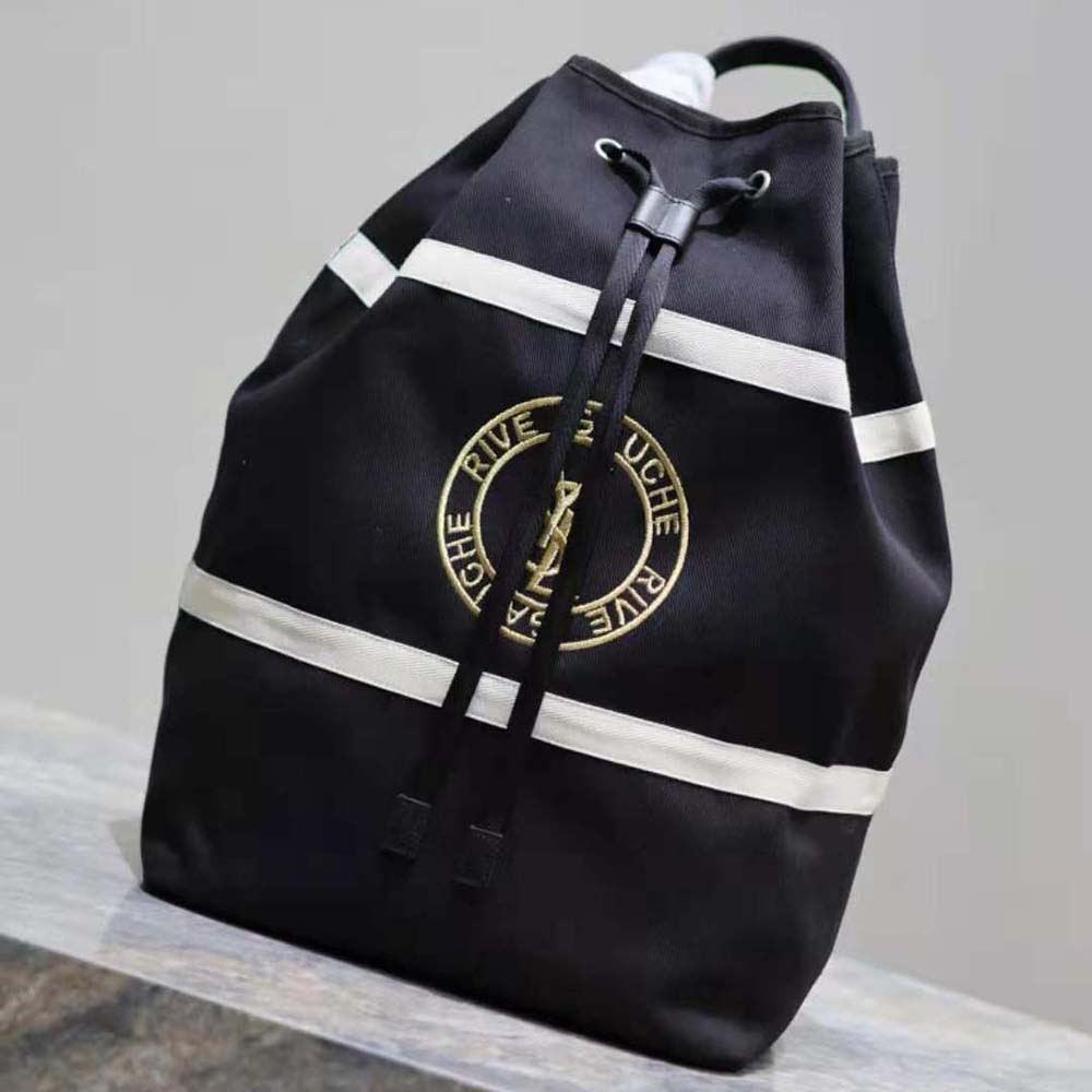 Side profile showing zipper closure and strap of Saint Laurent YSL sling bag