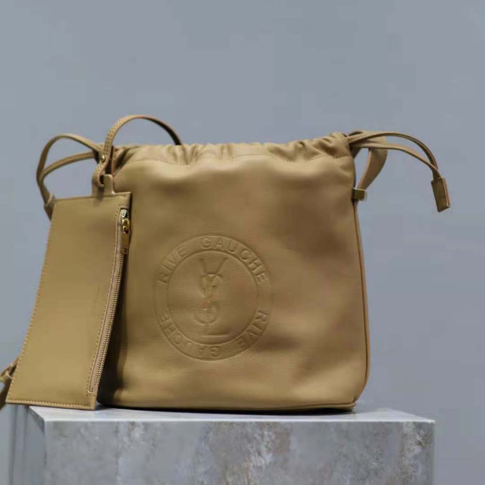 Close-up of laced bucket closure on Saint Laurent YSL Men Rive Gauche Bag