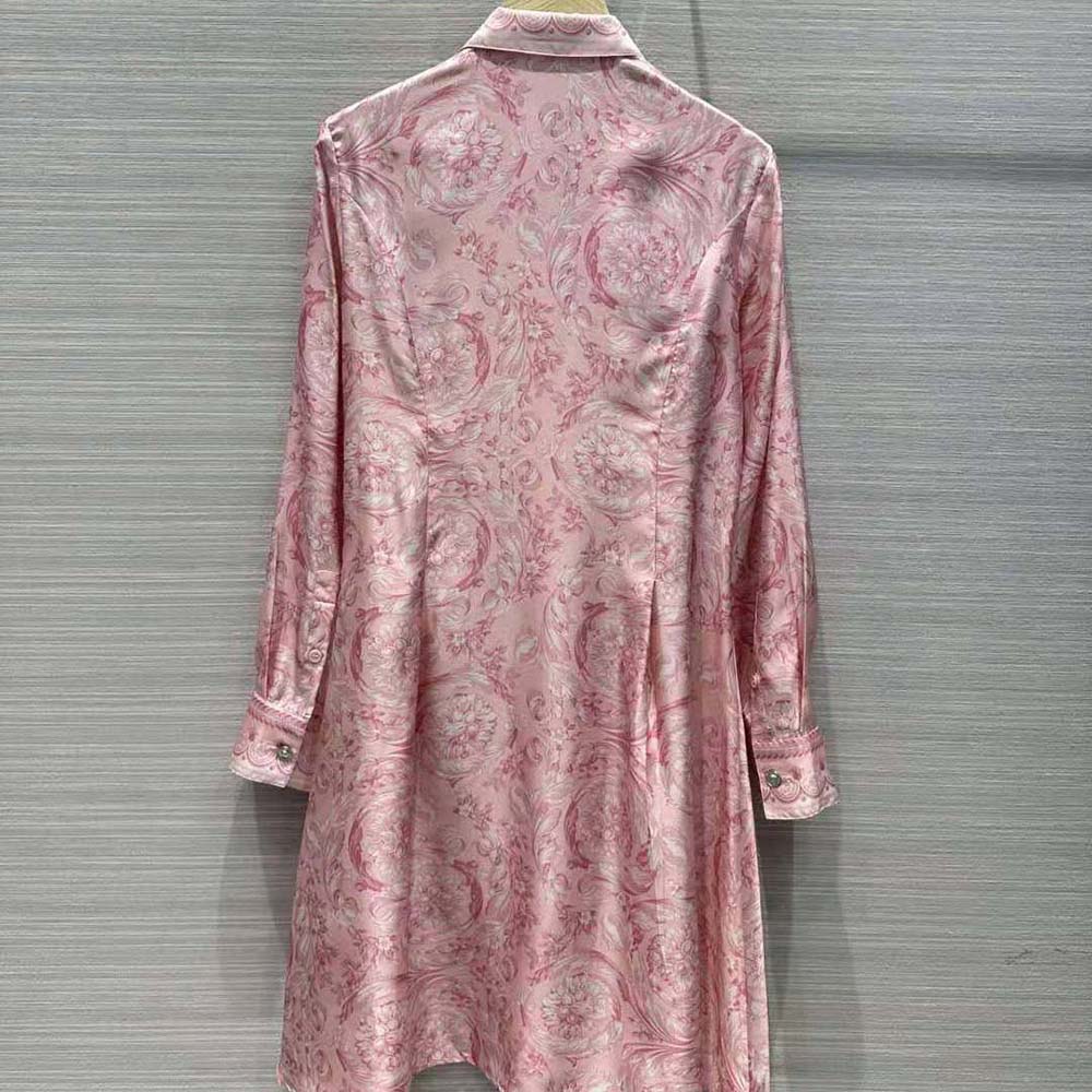 Side profile showing relaxed silhouette of Versace silk dress