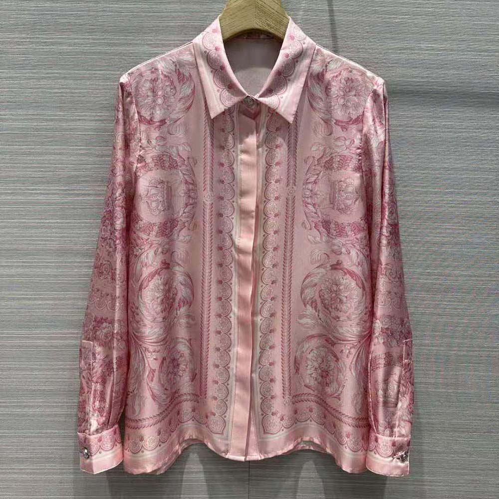 Close-up of gold-tone buttons on Versace Women Barocco Silk Shirt-Pink