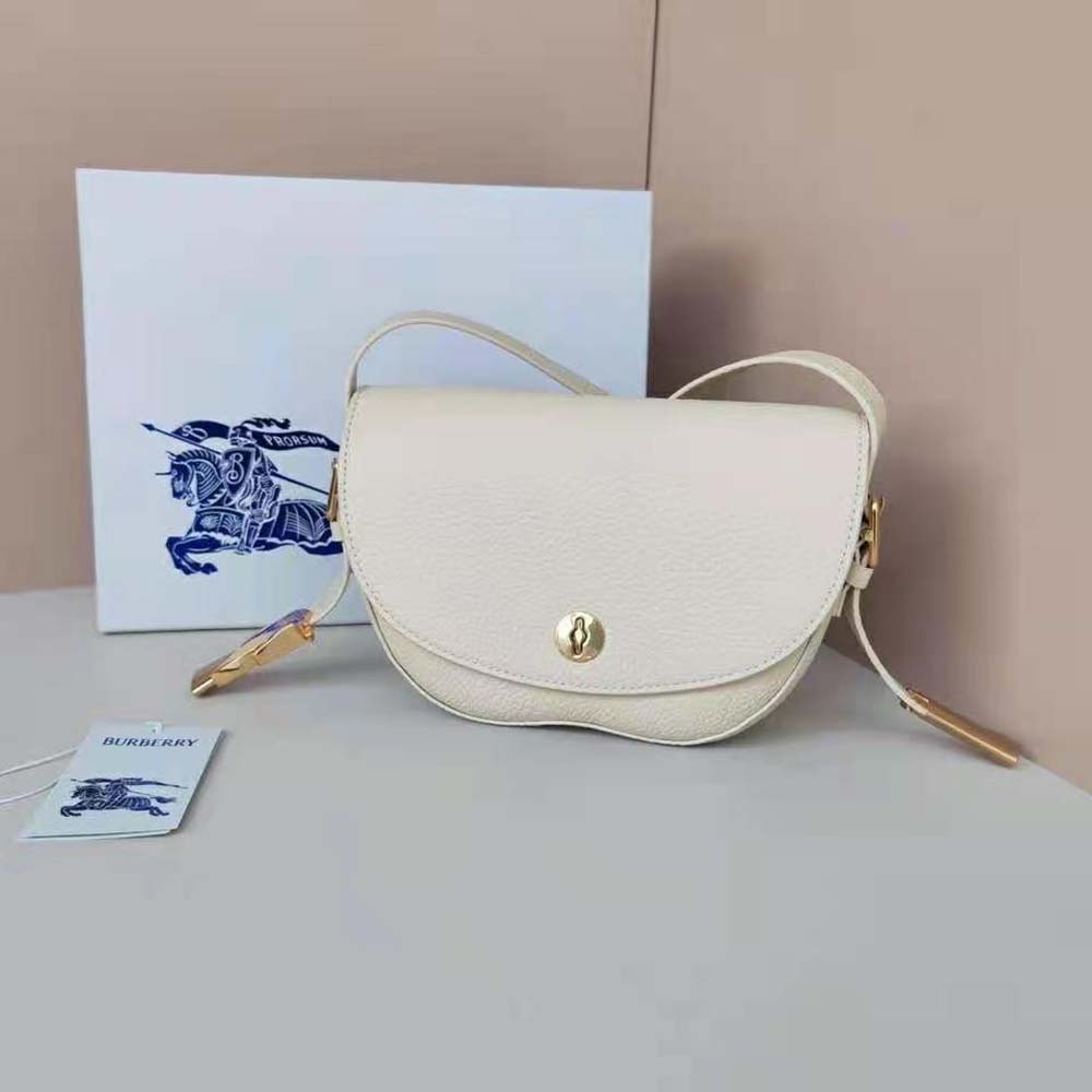 Close-up of Burberry Women Chess Satchel-White gold hardware detail
