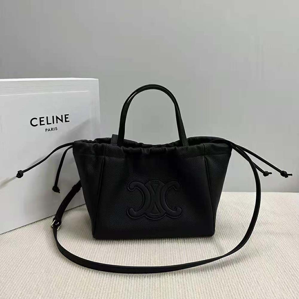 Close-up of gold Triomphe hardware on Celine Small Cabas bag