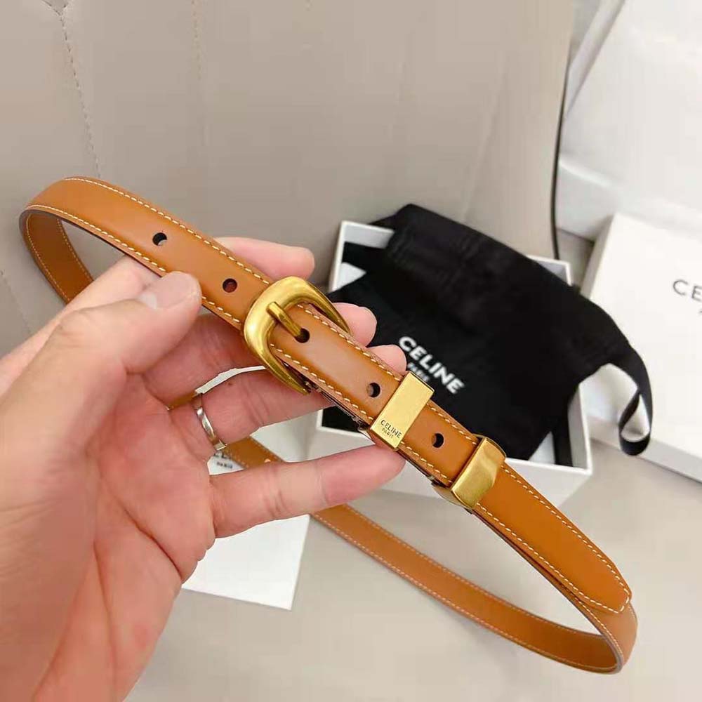 Close-up detail of gold buckle on Celine Women Small Western Belt