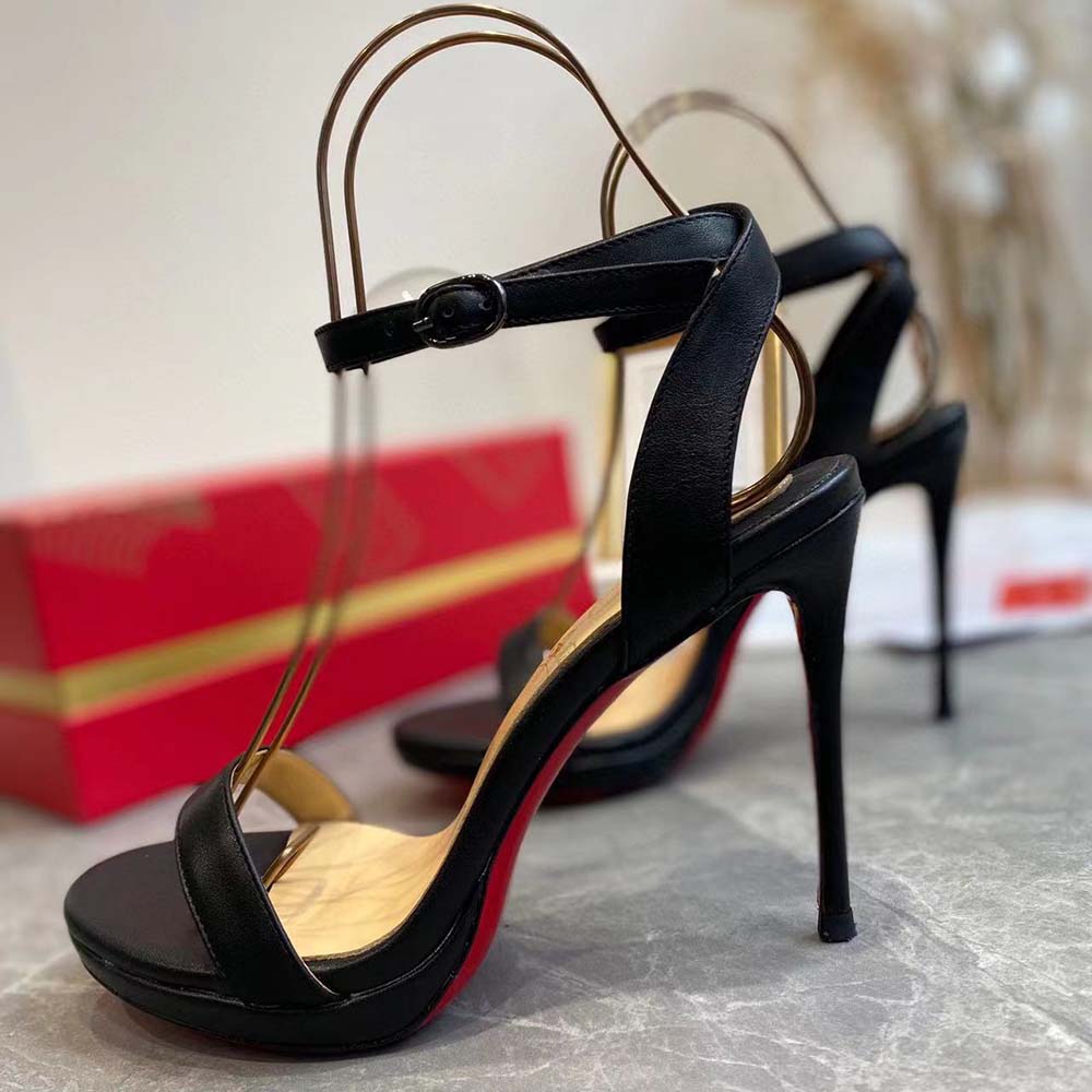 Overhead angle showing signature red sole of Christian Louboutin Loubi Queen sandals