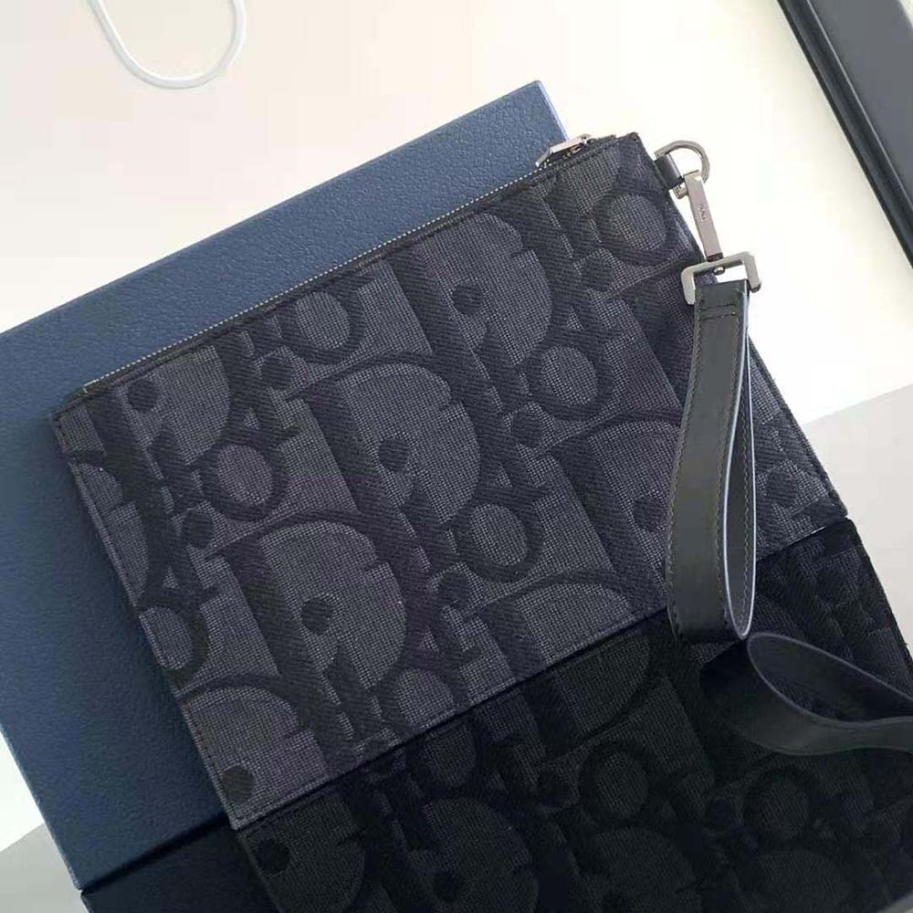 Side angle showing slim silhouette of Dior Men A5 Pouch Black