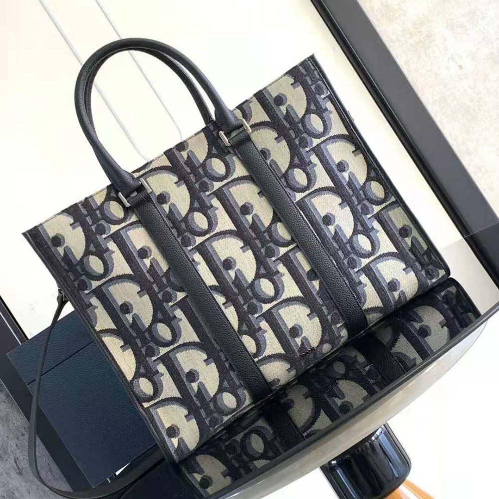 Side angle showing spacious interior of Dior Men East-West Tote Bag