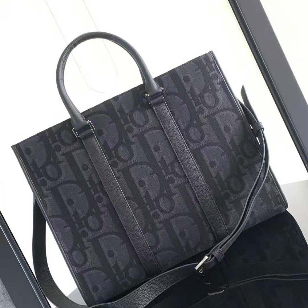 Close-up of silver-tone hardware on Dior Men East-West Tote Bag black jacquard