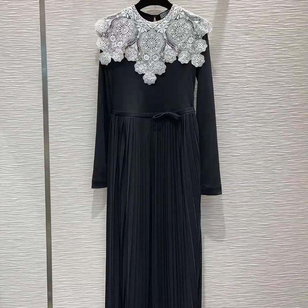 Close-up detail of white lace on Dior Women Mid-Length Pleated Dress