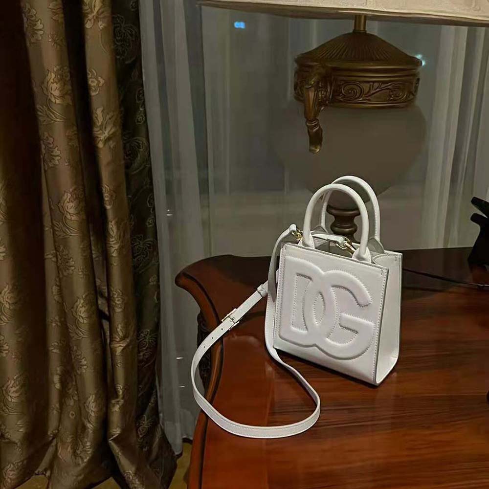 Side angle showing structured silhouette of DG Daily Mini Shopper-White