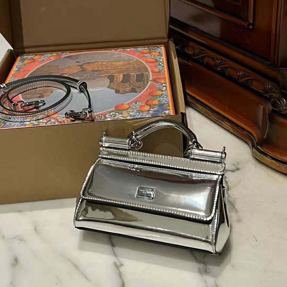 Side angle showing structured silhouette of Dolce Gabbana Small Sicily handbag