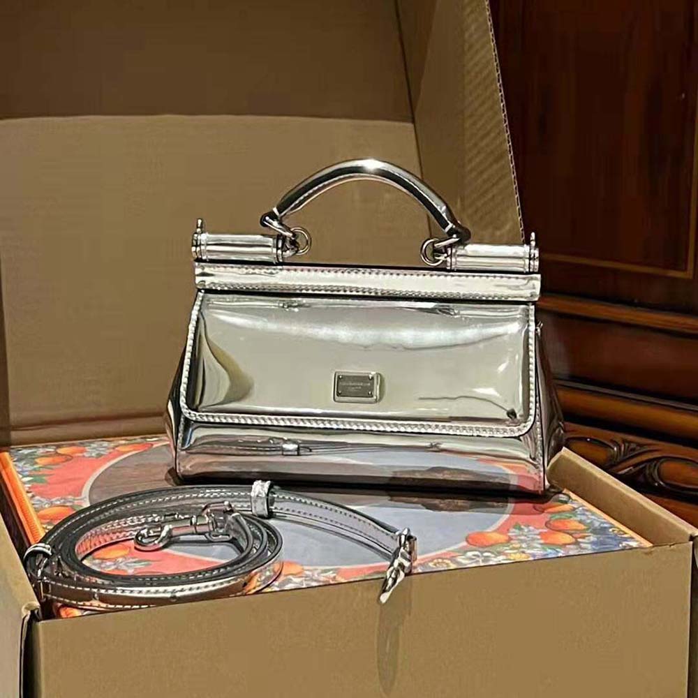 Close-up on signature silver hardware of Small Sicily Handbag