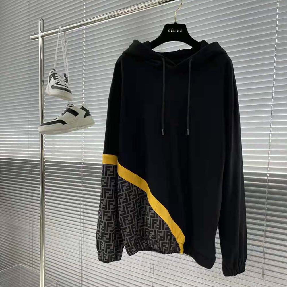 Close-up of Fendi logo embroidery on black jersey sweatshirt