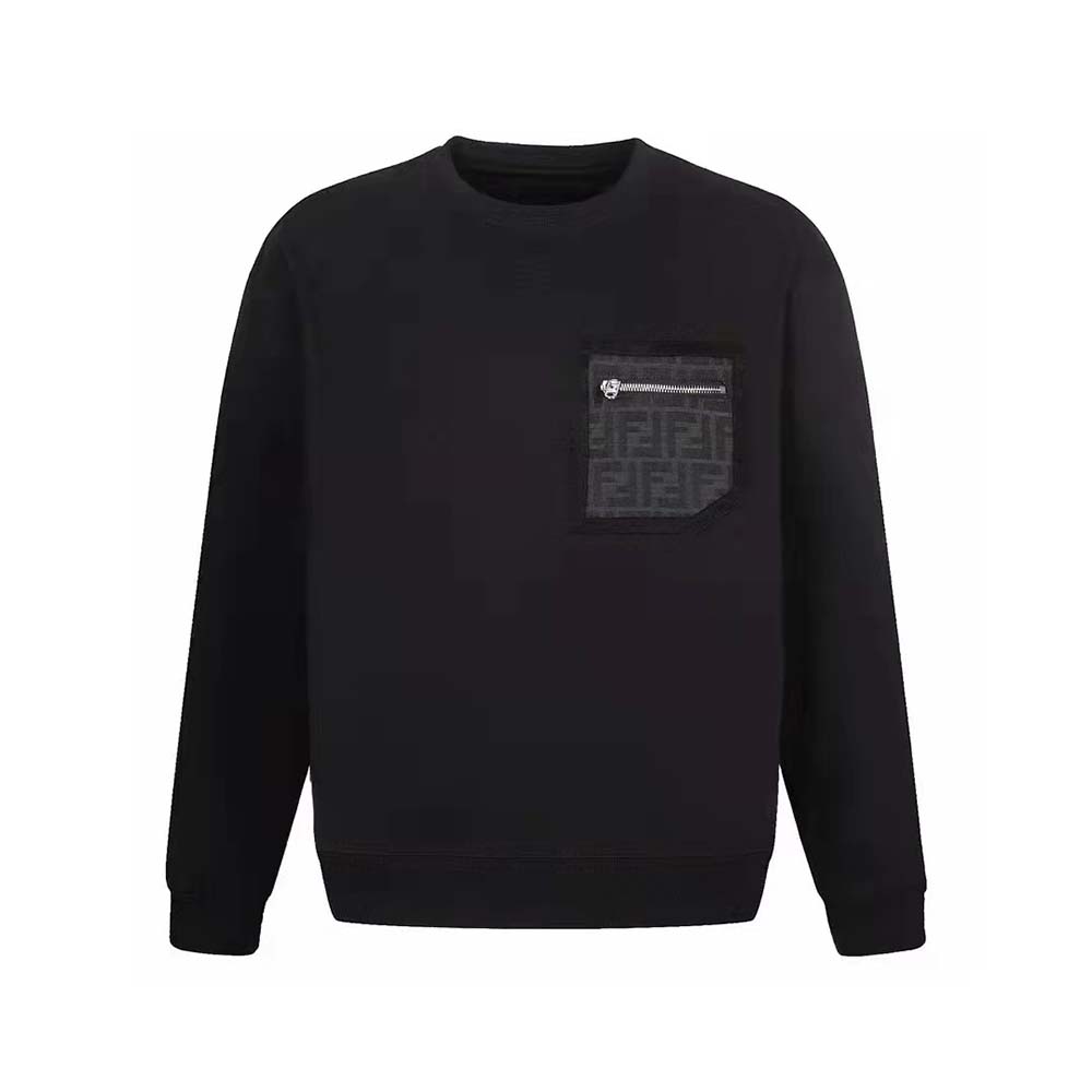 Close-up of Fendi logo detail on black jersey sweatshirt chest